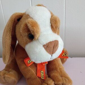 Plush Reese's stuffed puppy